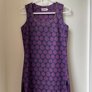 Holiday glitter: Cotton tunic with gold embellishments